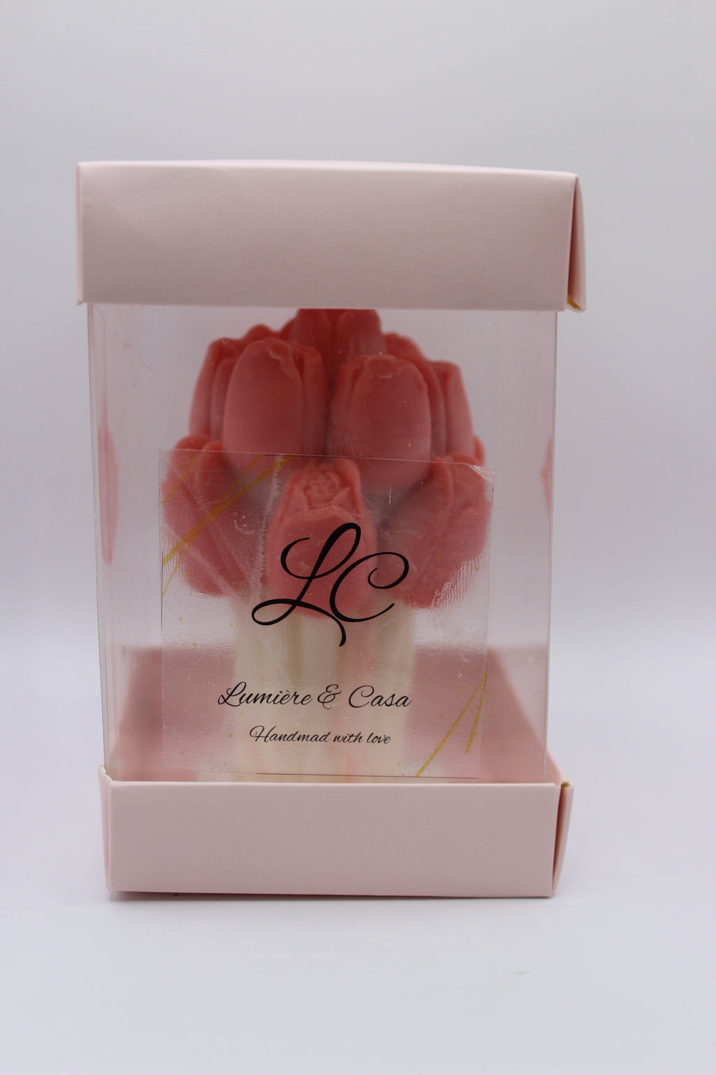 Ternura de Luz — vela aromática em caixa decorativa transparente, vista frontal