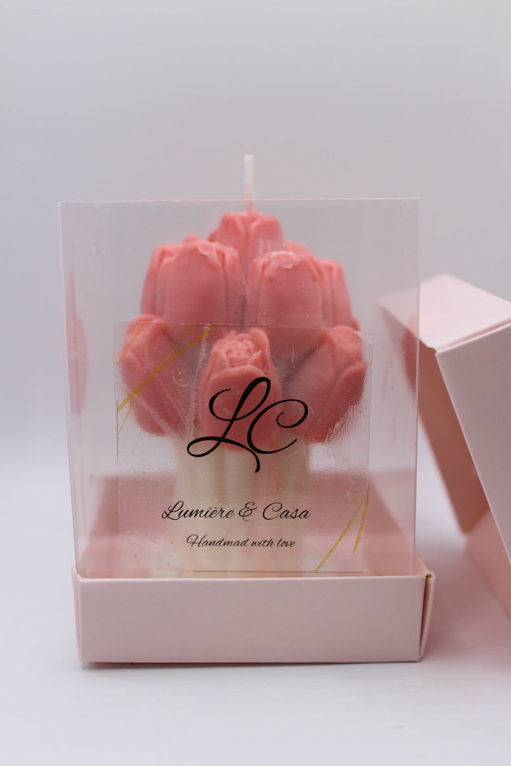Ternura de Luz — vela aromática em caixa decorativa transparente, vista lateral