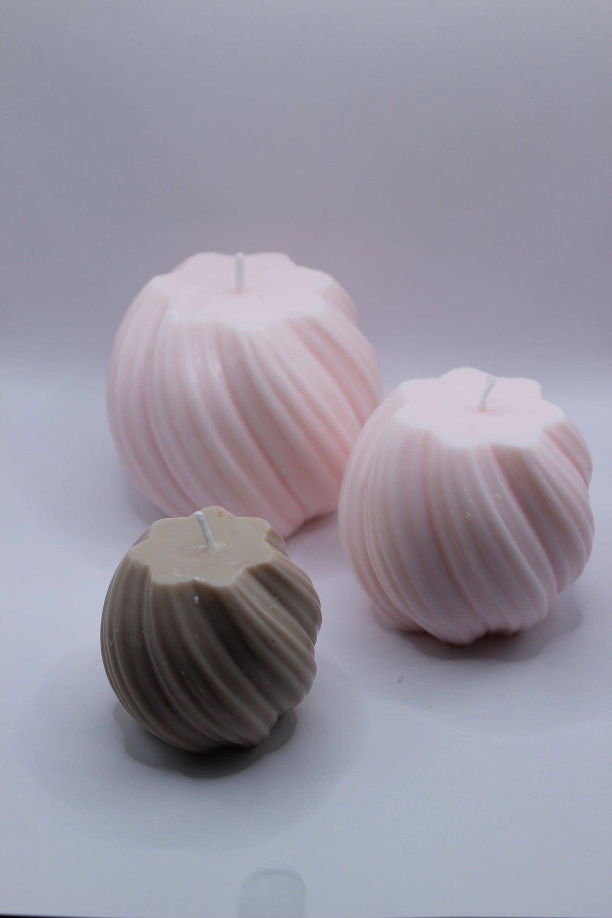 Vela Twirl Infinito – conjunto de 3 tamanhos em rosa e bege