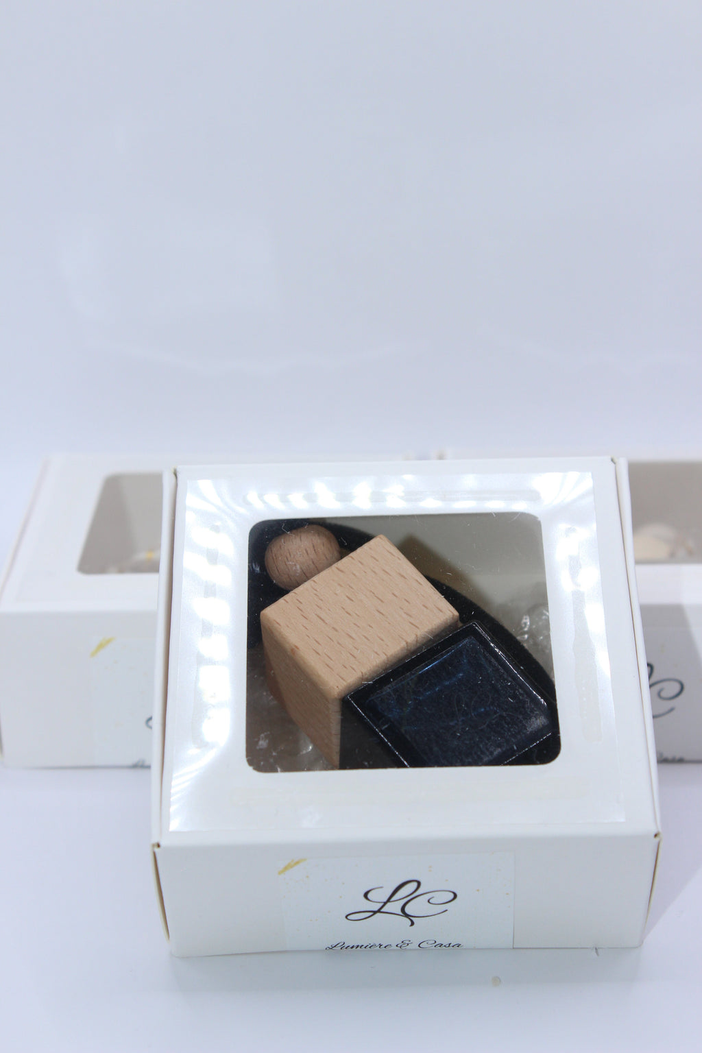 Aroma em Movimento – difusor preto e branco em caixa